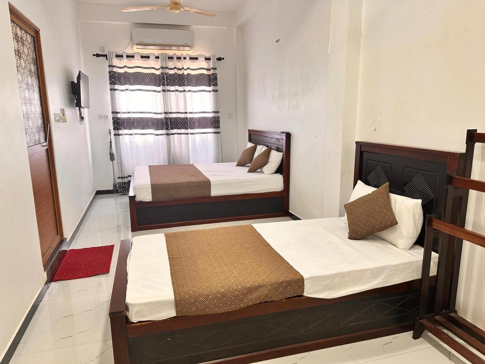 Holiday Villa تريكونامالاي المظهر الخارجي الصورة
